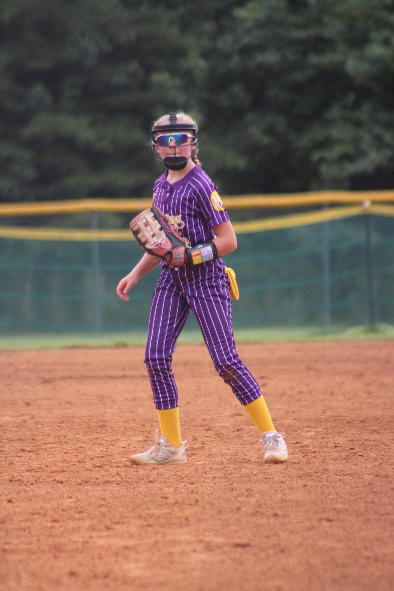 Monroe Mustangs player fielding on defense