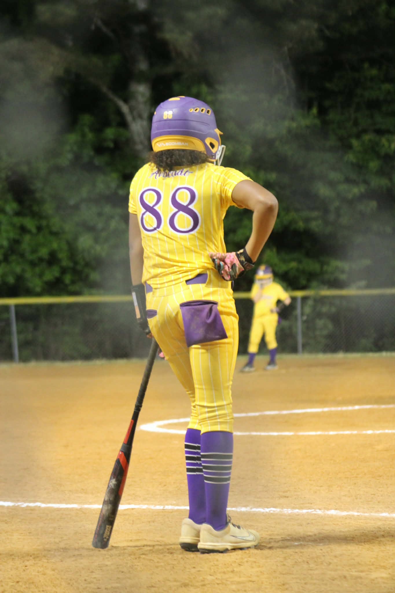 Mustangs player number 88 standing at the plate during a game